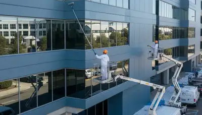Professional commercial painters working on Omaha NE office exterior
