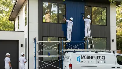 Professional exterior house painters in Omaha, NE applying durable weather-resistant paint finish