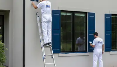 Professional shutter painting and refinishing on Omaha, NE home exterior by expert painters